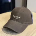 Dark brown baseball cap close-up, embroidered letter detail, wide brim sun hat texture view. - Adult 54-60 Adjustable / Coffee