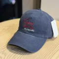 Washed cotton baseball cap with stylish front letter embroidery and soft brim for daily wear. - Adult 54-60 Adjustable / Navy Blue