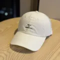 Detail shot of the white lightweight quick-drying sports baseball cap with front embroidery. - Adult 54-60 Adjustable / Beige