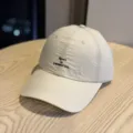 Detailed close-up view of the beige quick-drying baseball cap showing custom text embroidery. - Adult 54-60 Adjustable / Khaki