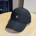 Detail shot of black lightweight quick-dry waterproof minimalist embroidered baseball cap. - Adult 54-60 Adjustable / Black