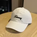 Detail view of the white quick-dry baseball cap with stylish black embroidery text on the front. - Adult 54-60 Adjustable / White