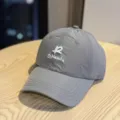 Quick-dry baseball cap detail shot, grey grid fabric with white embroidery for daily wear. - Adult 54-60 Adjustable / Dark Gray