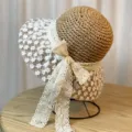 Dames zomer strohoed zonnehhoed met zoete witte kantstrik, elegante brede rand strandhoed. - Volwassenen 54-58 verstelbaar / Khaki