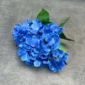 Detailed view of artificial blue hydrangea flower bunch, realistic floral decor for wedding and home. - Sapphire Blue