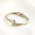 Minimalist metal open bangle bracelet, sleek geometric teardrop design for modern fashion women. - Style Four / Silver