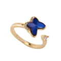 Vergoldeter offener Ring für Damen mit modischem blauen Schmetterling Edelstein Design. - Schmetterling Rotierender Ring - Gold Dunkelblau