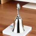 Shiny silver metal hand bell for restaurant service, dinner call, and classroom use. - Glossy / 10x4.5cm / Bright Silver