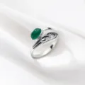 Bague ouverte argentée vintage avec pierre verte et détail de plume élégante. - Ouvert Ajustable / Style Texture Plume Pierre Précieuse Verte