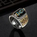 Détail de la bague pour homme rétro avec perle Dzi rotative et motifs sculptés fins. - Réglable / Perle Dzi Neuf Yeux Chanceuse