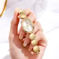 Montre quartz femme ovale dorée avec bracelet à maillons ronds uniques style élégant. - Or Blanc
