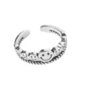 Detailed view of the vintage silver open ring featuring carved multiple smiley and sad faces. - Open Adjustable / Lucky Smile Ring Nine
