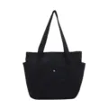 Grote zwarte canvas shopper tas voor dagelijks gebruik naar werk, kantoor en school. Vooraanzicht. - Zwart met Voering en Rits