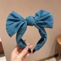 Serre-tête grand nœud bleu, bandeau large élégant avec design tridimensionnel. - Bleu