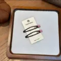 Süße schwarze Haarnadeln mit rosa Herz Design im koreanischen Stil für modische Frisuren. - Rosa Paar