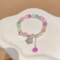Bracelet de perles en cristal craquelé coloré avec pendentif étoile en strass et charms. - Perles multicolores