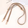 Adjustable tan leather strap with gold metal clasps for bag or phone cross-body use. - Khaki