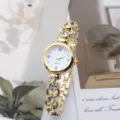 Women's gold quartz watch with rhinestone bracelet, elegant fashion timepiece for daily wear. - Gold