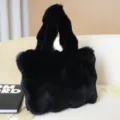 Elegante borsa a mano nera in pelliccia sintetica, grande shopper pelosa invernale donna. - Nero