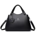 Sac à main noir classique en cuir pour femmes, élégant sac bandoulière avec charme. - Noir