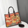 Squisito dettaglio di ricamo con paesaggio cinese sulla borsa, con motivi tradizionali. - Arancione
