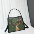 Embroidery deer design cross body bag detail view, stylish commuter shoulder bag for women. - Green