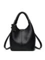 Black leather bucket handbag, versatile shoulder crossbody bag with cute bear charm. - Black