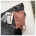 Minimalistische roze zachte leren schoudertas, trendy mini crossbody tas voor dames. - Roze