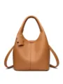 Stylish brown leather bucket bag for women, versatile handbag with cute bear tag. - Yellow