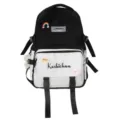 Stylischer schwarz-weißer Schulrucksack mit großem Fassungsvermögen und süßen Aufnähern. - Schwarz + Abzeichen + Anhänger