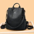 Zaino casual in pelle nera da donna, grande capacità viaggio borsa scolastica quotidiana. - Nero