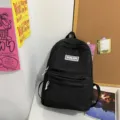 Black canvas backpack, Japanese style school bag, large capacity casual daypack for students. - Black