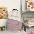 Zaino per studenti rosa e bianco di grande capacità, borsa per laptop casual e comoda. - Rosa