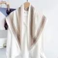 Close-up detail of the retro geometric patterned triangle scarf draped on a white shirt. - Retro Stripe Print Style (TH-08) / TH-87*130CM