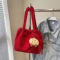Red corduroy tote bag variant with cute plush charm, casual shoulder bag for daily commute. - Burgundy