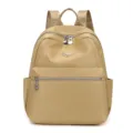 Sac à dos en nylon décontracté pour femme, grand sac de voyage kaki au design élégant. - Fennel