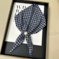 Detail view of a stylish blue and white grid silk scarf featuring an elegant pearl magnetic buckle. - Blue and White Plaid Style (TYY-06)