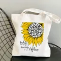 Canvas tote bag with sunflower heart print, teachers day shoulder shopping bag main view. - Style 18 (Seeds of Knowledge Sunflower) / 35x40cm
