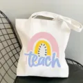 White canvas tote bag featuring teacher rainbow print, casual everyday shoulder bag. - Style 5 (Simple Teach) / 35x40cm