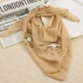Detailed view of women's vintage embroidered sequin floral triangle headscarf chiffon wrap. - Earthy Yellow