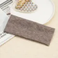 Brown ribbed knit headband detail shot showing textured fabric and versatile daily wear style. - Dark Brown