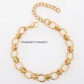 Detail view of golden stainless steel dumbbell link chain jewelry component, smooth polished surface. - Polished Oval Dumbbell Style / Bracelet (17+5cm) / Gold