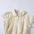 Korean style short sleeve blouse with Peter Pan collar, pintucks, and delicate lace trim. - S / Tops / Pale Yellow