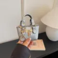 Mini silberne Handtasche kleine Tasche Schlüsselanhänger Anhänger Trend stylische Damentasche neu chic - Silber