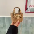 Mini tan leather handbag charm with gold hardware, chic crossbody bag for women and girls. - Yellow