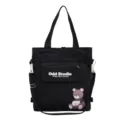 Schwarzer Canvas Multifunktions Rucksack und Umhängetasche mit Bären Druck und Fronttasche. - Schwarz