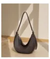 Brown leather crescent shoulder bag, stylish hobo underarm handbag for women daily wear. - Ebony