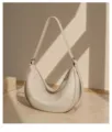 Premium leather crescent shoulder bag, soft hobo purse with secure zip closure and chic style. - Trench Gray