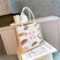 Leinen-Tragetasche als praktische Lunchtasche mit süßem Brotmuster-Druck für den Alltag. - Broht Markt Muster