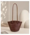 Handmade woven leather bucket bag detail, showcasing intricate craftsmanship and texture. - Coffee